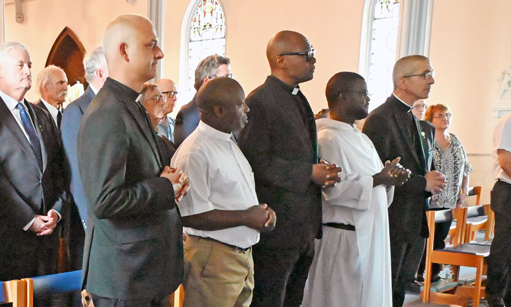 New Fourth-Degree Knights include the bishop and four priests